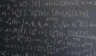 blackboard full of mathematical formulae